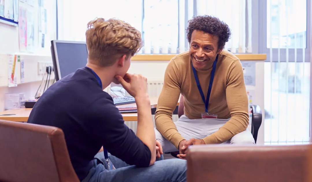A teacher and student having a conversation