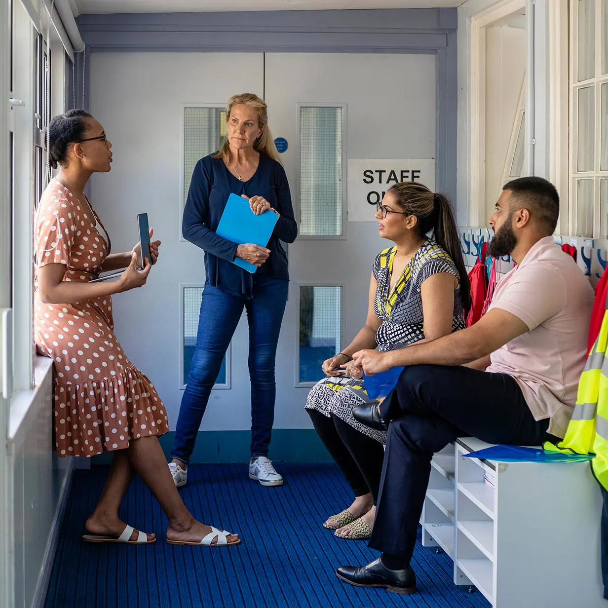 Education professionals having a discussion.