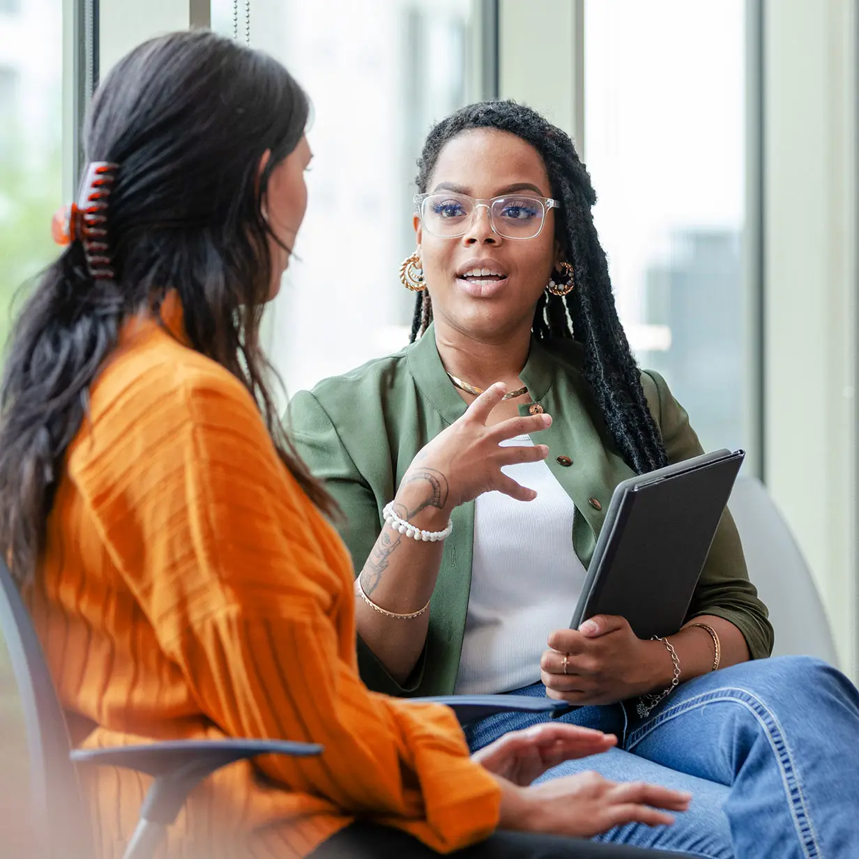 Two women having a conversation.
